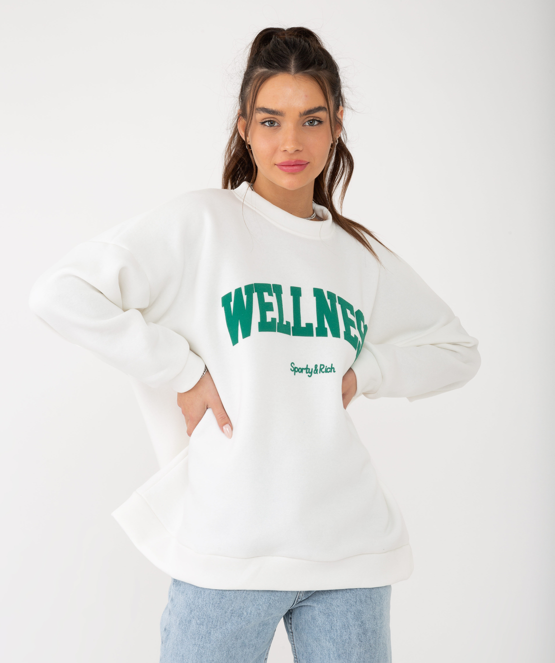 white sweatshirt with green writing