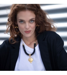 Black crocheted necklace with a unique gold-plated pomegranate pendant