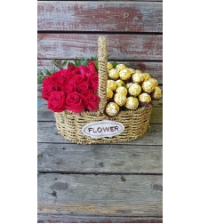 Arrangement of roses and Ferrero Rocher in a basket