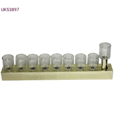 Gold tin menorah with glass cups