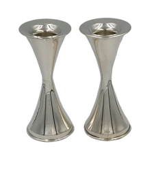 A pair of pure silver M hourglass candlesticks