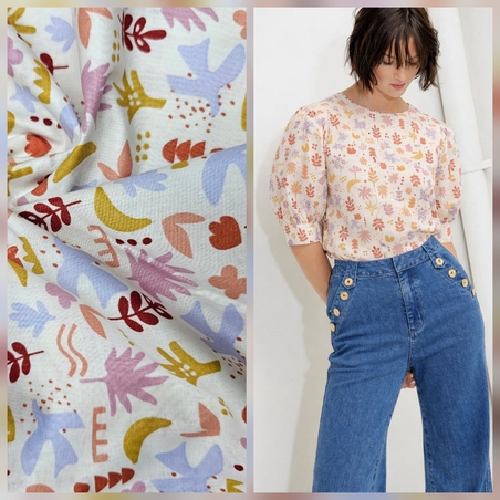 אריג כותנה דפוס ציפורים ועלים על רקע לבן חם