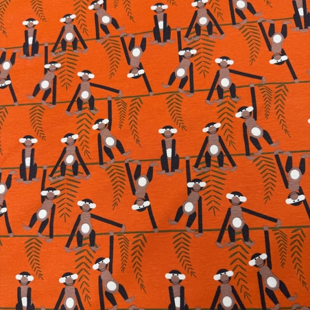 טריקו כותנה דפוס קופים שמחים על רקע חמרה