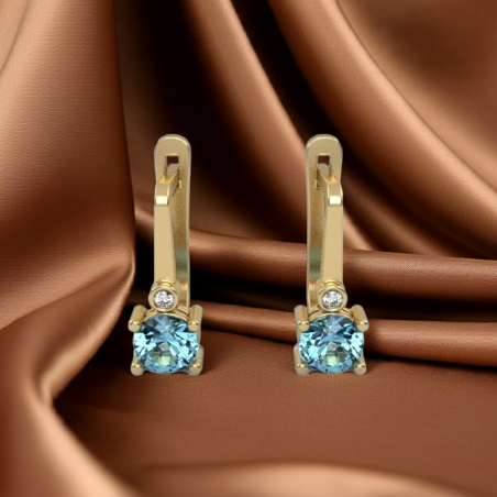 Earrings made of 14k gold set with Blue Topaz Suisse stones and diamonds model EAG36