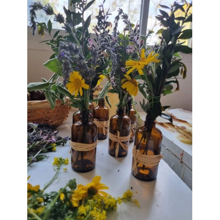 Dried Flowers in Glass Bottle