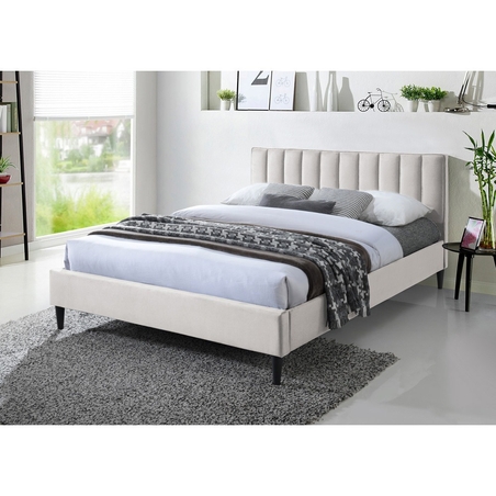 מיטה זוגית מעוצבת עץ מלא מרופדת דגם פולי קרם