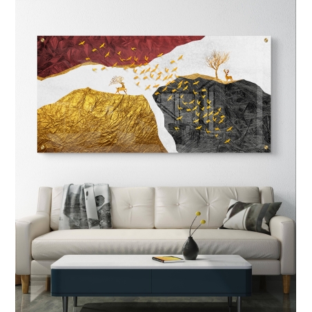 תמונת זכוכית חלקה מחולקת עם איילים עומדים על גבעות בגווני זהב ושחור, ולהקת ציפורים ברקע אדום דרמטי