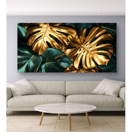 תמונת קנבס רחבה עם עלי מונסטרה בצבע ירוק עמוק וזהב, בעיצוב יוקרתי ומודרני, מתאימה לסלון, למשרד ולפינות ישיבה מעוצבות.