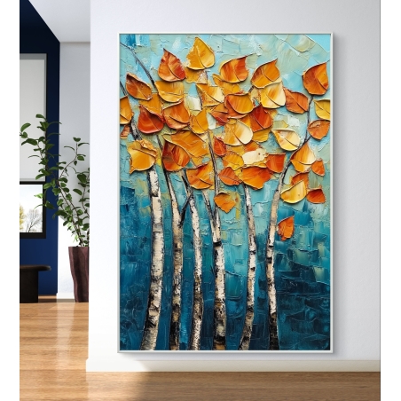 תמונת קנבס צבעונית של עצי שלכת עם עלים כתומים־זהובים על רקע טורקיז עז, תלויה על קיר לבן בחלל מעוצב.