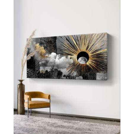 תמונת קנבס לרוחב בשחור וזהב המציגה שמש זורחת מאחורי ירח על רקע עננים, בעיצוב יוקרתי מבית תכשיט לבית