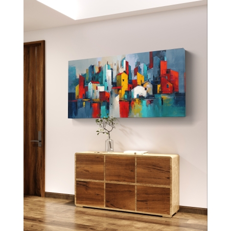 תמונת קנבס לרוחב בסגנון אבסטרקט מודרני של עיר צבעונית בגווני אדום, צהוב וטורקיז המשתקפים במים – ״עיר הצבעים״