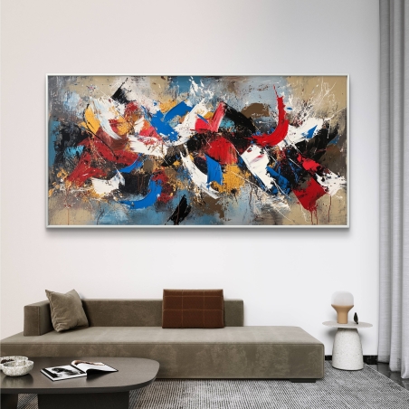 תמונת קנבס לרוחב בסגנון אבסטרקטי עם שילוב צבעים עזים של אדום, כחול, שחור ולבן, המעניקה תחושת אנרגיה ותנועה מודרנית לקירות הבית.