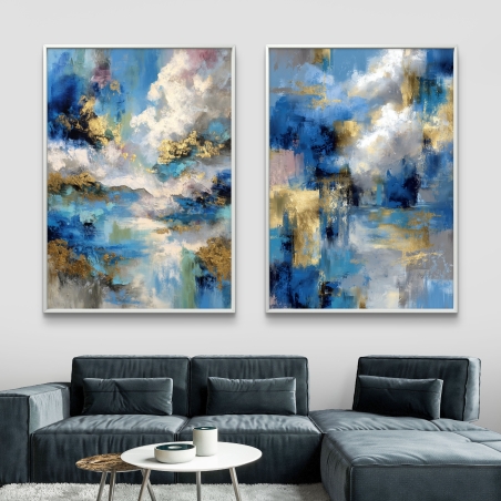 זוג תמונות קנבס מופשטות בגווני כחול וזהב עם לבנים ועננים, הדפסה חלקה ואיכותית – עיצוב יוקרתי מקולקציית תכשיט לבית.