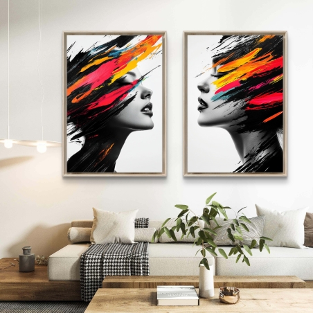 זוג תמונות קנבס עם דמות אישה וכתמי צבע נועזים בגווני כתום, ורוד ושחור, מודפסות על קנבס חלק ואיכותי בעיצוב מודרני לבית