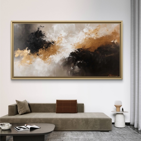 תמונת קנבס בגווני שחור, זהב ולבן תלויה מעל ספה ירוקה בסלון בעיצוב מודרני