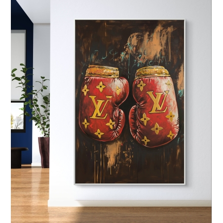 תמונת קנבס של זוג כפפות איגרוף אדומות עם סמל יוקרתי, על רקע כהה עם נגיעות צבע. יצירת קיר בסגנון מודרני ונועז.