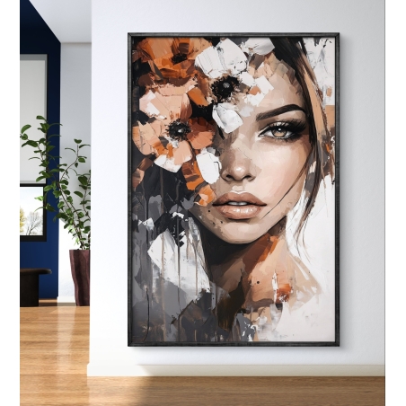 תמונת קנבס אומנותית המציגה דיוקן אישה המשתלב עם פרחים בגווני כתום ולבן, בעיצוב מודרני המעניק לחלל מראה חמים, ייחודי ואלגנטי.