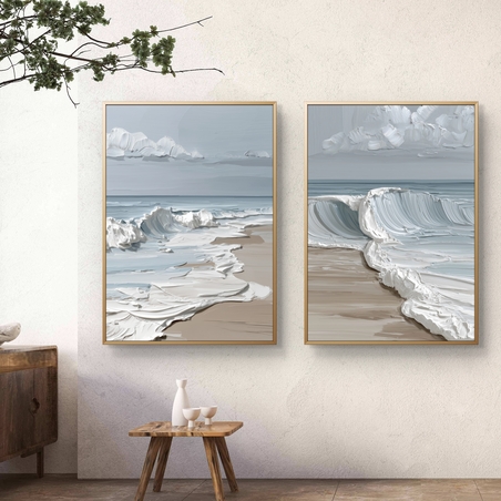 זוג תמונות קנבס גלי ים בגווני תכלת ולבן בעיצוב מודרני