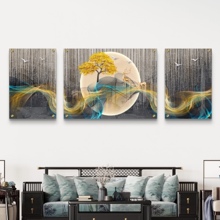 תמונה מחולקת על זכוכית עם עצים זהובים, איילים ואפקטים של אור וטורקיז – עיצוב יוקרתי ומרהיב מהקולקציה של תכשיט לבית