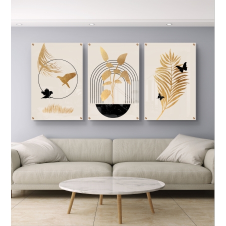 סט של שלוש תמונות זכוכית בגווני זהב ושחור עם ציפורים, עלים וקווים גיאומטריים בעיצוב מודרני ומינימליסטי