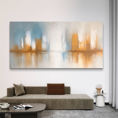 תמונת קנבס רחבה עם נוף מופשט בגווני כחול בהיר, לבן וזהב, המתאימה לחללים מודרניים להוספת תחושת רוגע ויוקרה.