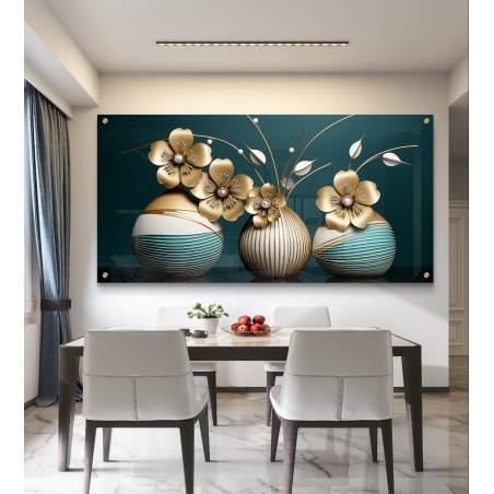 עיצוב מודרני של תמונת זכוכית המתארת שלושה כדורים מעוצבים בצבעי זהב וטורקיז, מעוטרים בפרחים יוקרתיים ועדינים עם פרטים מדויקים. התמונה משדרת תחכום ואלגנטיות, מתאימה במיוחד לפינת אוכל בעיצוב יוקרתי ומודרני