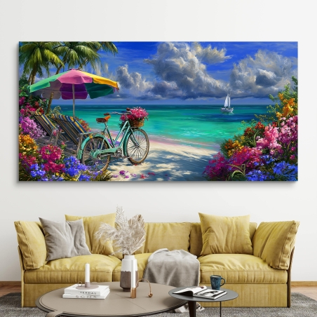 תמונת קנבס לרוחב עם נוף חוף טרופי צבעוני, אופניים תכלת עם סלסלת פרחים, שמשייה צבעונית, פריחה מרהיבה וסירת מפרש ברקע.