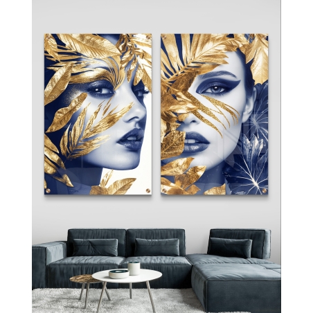 תמונות זכוכית זוגיות של פנים נשיות מעוצבות בעלי זהב עם נגיעות כחול עמוק, מתאימות לעיצוב יוקרתי ומודרני לבית.