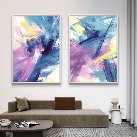 זוג תמונות קנבס מופשטות עם משיכות מכחול בגווני כחול, סגול, צהוב ולבן בעיצוב מודרני