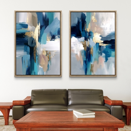 זוג תמונות קנבס בעיצוב מופשט בגווני טורקיז, כחול ולבן עם נגיעות זהב, מודפסות על קנבס חלק ואיכותי, במסגרת לבנה
