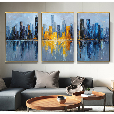 סט של שלוש תמונות קנבס עם נוף עירוני מודרני והשתקפות צבעונית של גורדי שחקים במים