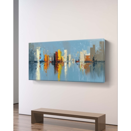 תמונת קנבס לרוחב – קו רקיע עירוני מופשט בצבעי כתום, צהוב, כחול ואפור המשתקפים במים, בהדפסה חלקה ואיכותית מבית תכשיט לבית.