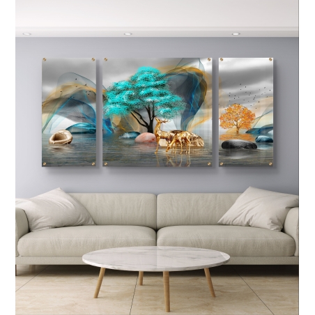 תמונת זכוכית מחולקת לשלושה חלקים עם איילים מוזהבים, עצים טורקיז וכתומים ואבנים צבעוניות על פני מים רגועים