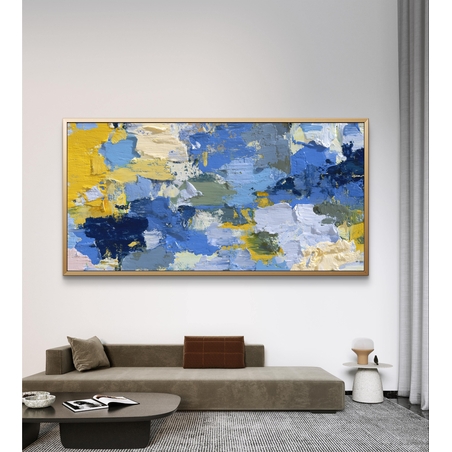 תמונת קנבס אבסטרקטית לרוחב בגווני כחול וצהוב עם שכבות צבע ותנועת מכחול מודרנית
