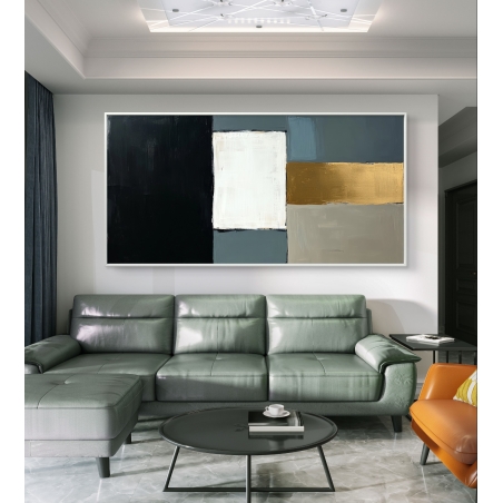 תמונת קנבס מודרנית בגווני שחור, לבן, אפור וזהב, תלויה מעל ספה ירוקה בסלון מעוצב