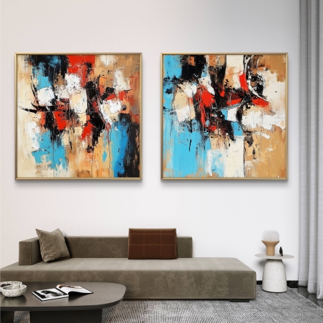 זוג תמונות קנבס מרובעות בסגנון אבסטרקטי עם גווני אדום, כחול, שחור ובז', היוצרות תחושת תנועה וחיות בחלל המגורים