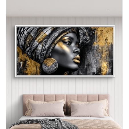 תמונת קנבס לרוחב של אישה אפריקאית בגווני שחור וזהב עם עגילים וטורבן, הדפסה חלקה ואיכותית – מקולקציית תכשיט לבית