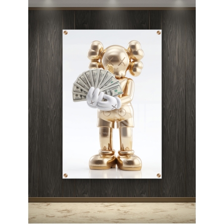 תמונת זכוכית של דמות מוזהבת המחזיקה שטרות כסף – מתוך קולקציית NEXTGEN BY BAR של תכשיט לבית, בעיצוב מודרני ומבריק.