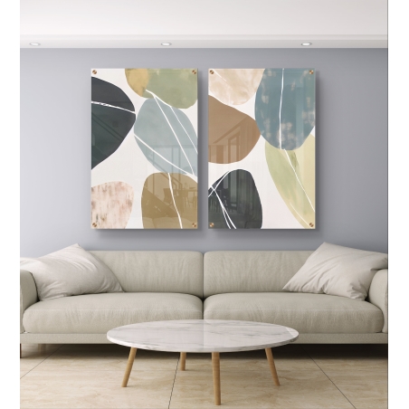 זוג תמונות זכוכית עם איורי עלים מופשטים בגווני ירוק, תכלת, בז' ושחור מתוך קולקציית תכשיט לבית