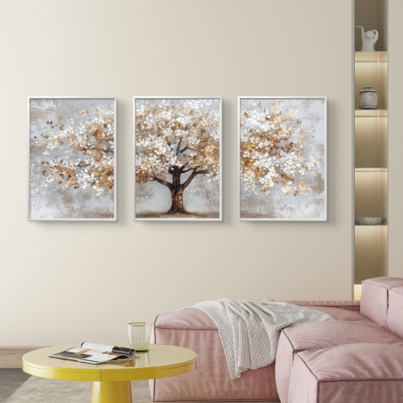 סט של שלוש תמונות קנבס המציגות עץ שלכת עם עלים בגווני זהב ולבן על רקע בגווני אפור בהיר, תלויות על קיר לבן.