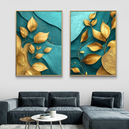 זוג תמונות קנבס עם עלים מוזהבים על רקע טורקיז עמוק, לעיצוב יוקרתי והרמוני.