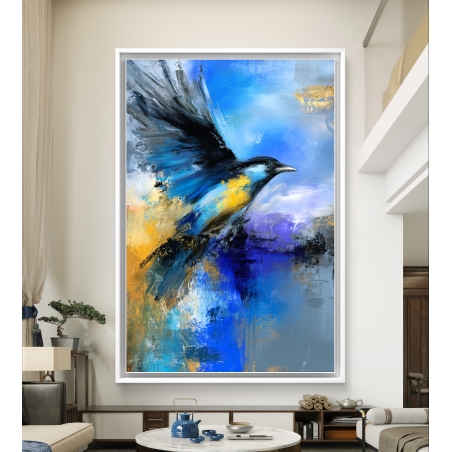 תמונת קנבס של ציפור בתעופה בגווני כחול, סגול וזהב, מודפסת על קנבס חלק ואיכותי בסגנון אמנותי עכשווי.