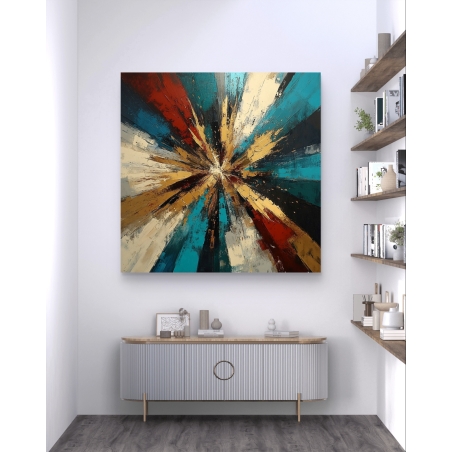 תמונת קנבס מרובעת המציגה פיצוץ דינמי של קרני צבע בגווני כחול, זהב ואדום, מעניקה תחושת תנועה ועומק לעיצוב הפנים.