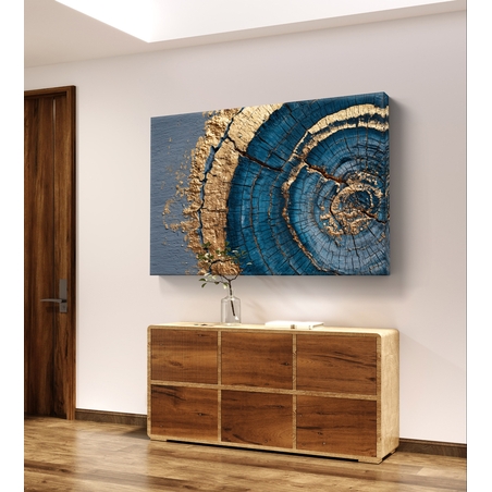 תמונת קנבס אבסטרקטית עם מעגלים בגווני כחול וזהב בהשראת חתך עץ