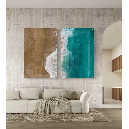 זוג תמונות זכוכית במבט על של חוף וים, מפגש בין חול חמים למים טורקיזיים בעיצוב מודרני ורגוע לקיר הבית