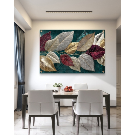 תמונת זכוכית בעיצוב אומנותי עם עלים מטאליים בגווני זהב, כסף ואודם על רקע טורקיז כהה – מקולקציית תכשיט לבית