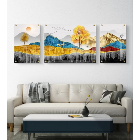 תמונת זכוכית מחולקת לשלושה חלקים המציגה נוף מופשט עם הרים בגווני כחול וזהב, עצים בשלכת וציפורים – מודפסת על זכוכית חלקה עם גימור מבריק.