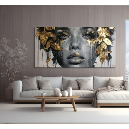 תמונת זכוכית לרוחב עם דיוקן נשי בגווני שחור וזהב, עם עלים מוזהבים בעיצוב אמנותי מרהיב, מבית תכשיט לבית