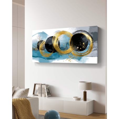 תמונת קנבס לרוחב עם עיגולים שחורים ומעגלי זהב על רקע כחול ואפור – קולקציית תכשיט לבית