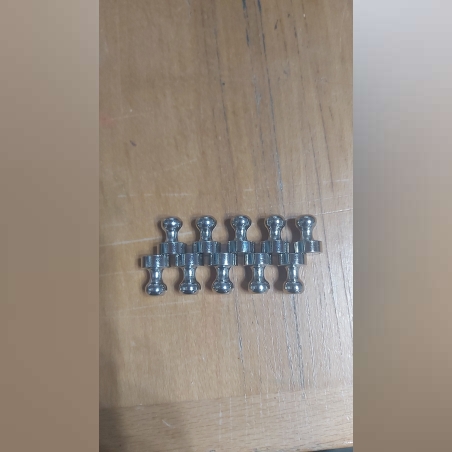 Strong magnets for holding parchment.